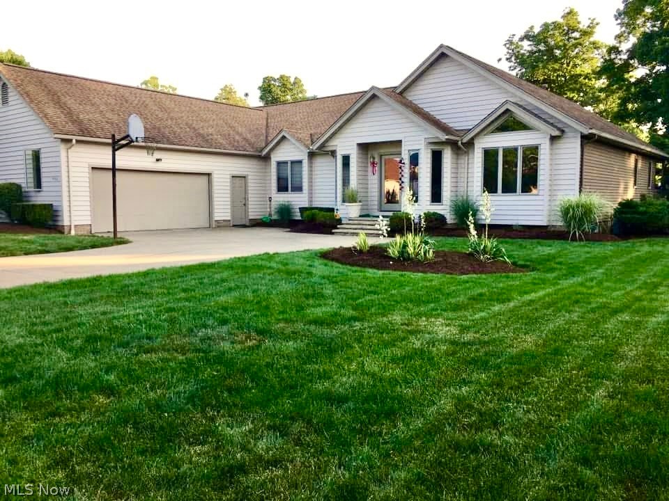 We're bringing oaky back! Welcome to the world of waterfront living right here in Wooster! This 90's Parade of Homes house still has it going on. Designed so well it works for a family or just one or two people. The built-ins, bookshelves and trim are all expertly crafted from oak. Leave it as is or add your own flair with paint! This is a home that is perfect for entertaining, inside and out. There is an easy flow through the rooms and onto the decks through multiple sets beautiful French doors. You can access the backyard and beach, yes I said beach, from the decks or the walk-out basement. Speaking of basement, there is a great room with a stone fireplace, built-in entertainment unit and enough space to add your own twist.  The other half of the basement holds a finished room, multiple closets, a bathroom with a sauna and to finish it off a workspace with cabinetry! Schedule your showing today!!