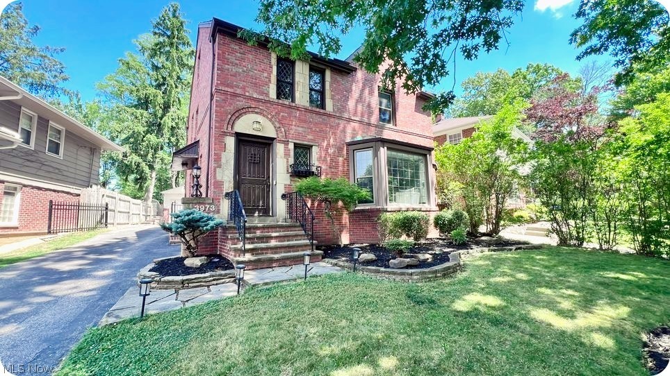 Welcome to one of University Hts. spectacular all brick colonial homes with a fully fenced bckyrd. Curb appeal is so
alluring that once you enter, you'll be pleasantly overjoyed. Greeted by a stone floor entrance leading to solid oak
flooring in liv/din rms. Grand liv. rm offers gas frplc, 3 sided bay wndw & cove ceiling. Formal din rm complete with
wainscoting, custom chandelier, cove ceiling & french doors leading outside to custom covered patio....but wait,
adjacent to the din rm is the eat in-kitchen with wall counter & 2 stools, granite counters, custom backsplash, stainless
steel appliances, track lighting, & luxury vinyl floors, plus a 1/2 bth down short hallway. Upper level offers primary
bdrm with en-suite, wall closets & solid oak floors, 2 additional bdrms both with solid oak floors, 2nd full bth with tile
surround, a tub, & custom tile flooring....level 3 offers great storage, or could become finished living space, playroom,
office, 4th bdrm, etc. Head to lower level and, Wow, a wet bar with 4 stools, plus seating area! The utility side has
laundry rm with space for a workshop, or storage. Back to the french doors leading to the custom covered
patio....there's string lighting....if that's not enough venture to the backyard with a shed & fire pit. Your own oasis just
hit the market! Home will be POS compliant.