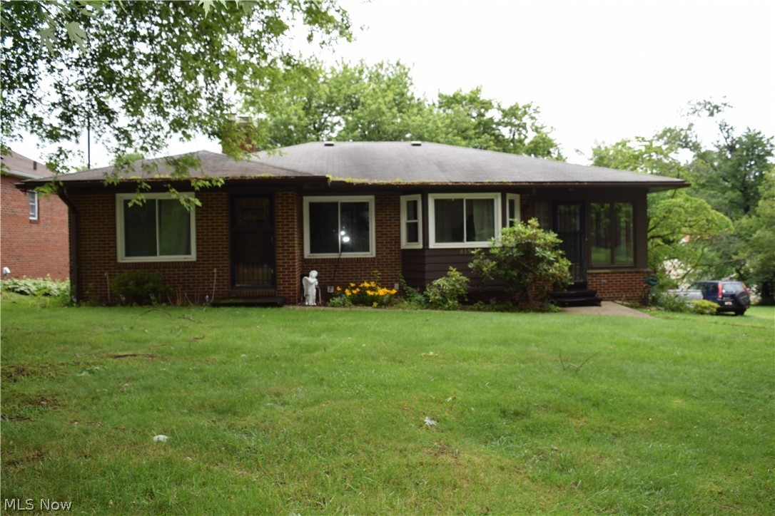 Welcome home to 639 E. Baird Avenue. All brick 3 bedroom, 1 bath ranch with partially finished walk-out basement. New carpeting in living room and bedrooms (4 years). 1st Floor laundry. Kitchen updated with white cabinets and stainless steel appliances. Formal dining room. Family room in basement with newer carpet (2 years). Sun room for relaxing. Newer vinyl windows in front of house, older windows in back of house.