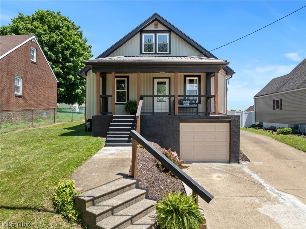 Move-in ready 3-bedroom, 2-bath home located in Weirton, WV, featuring updated finishes throughout and turnkey ownership potential. This renovated property offers an updated kitchen with stainless steel appliances, refreshed bathrooms, updated flooring, and modern interior finishes.

The home provides a comfortable living space along with a flexible upper-level area featuring a bedroom, potential office space, plenty of storage, and additional living space. Enjoy the covered front porch, spacious concrete driveway, and 3 garage spaces, including an attached 1-car garage and a detached 2-car garage.

The detached garage offers excellent storage, workshop potential, hobby space, or additional vehicle parking. Conveniently located near local amenities, shopping, schools, and major travel routes.  Call today to schedule your private showing.
