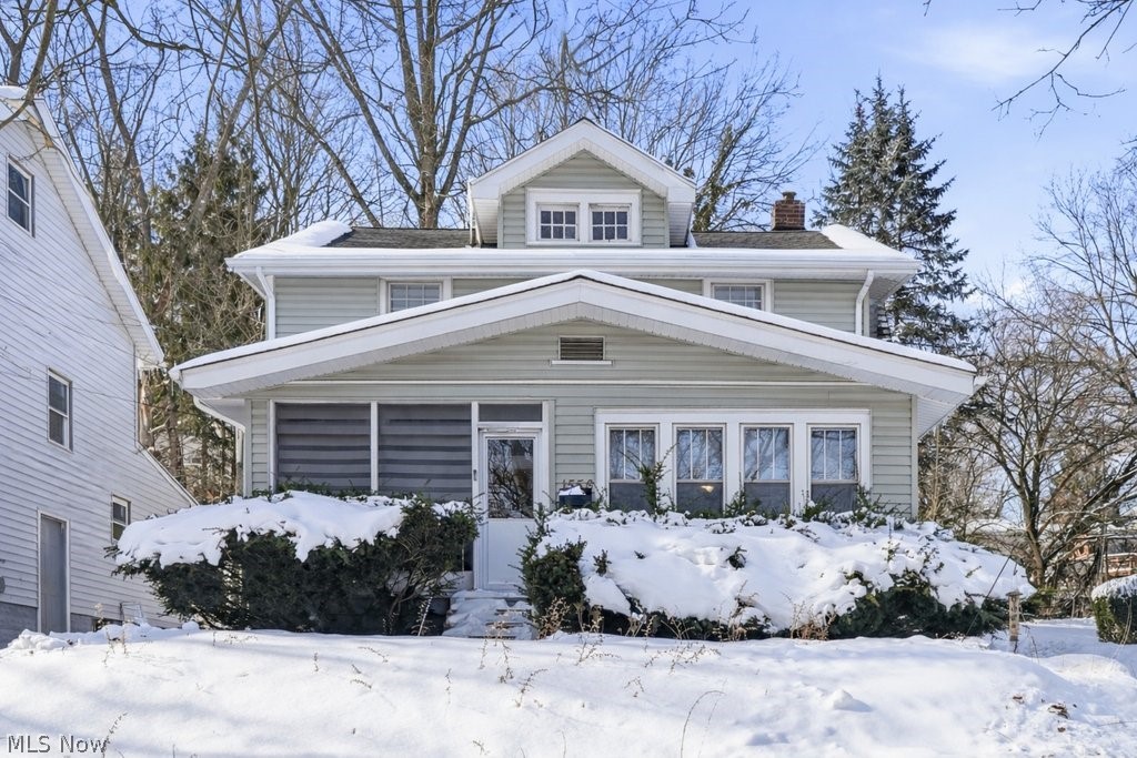 Come see all this charming colonial has to offer while searching for your new home! Lots of character with the built-ins, hardwood flooring, arched doorways, and charming woodwork which are exactly what makes this house feel like a home! When you head up the front steps you will enter in through the enclosed porch perfect for enjoying coffee and a cool breeze in the nicer weather or just a great place to kick off your boots and keep your living room carpet nice and clean when it's mucky outside. You have plenty of room for relaxing around the cozy fireplace in this living room and a bonus sun room walled with windows to make an extra sitting room, office, or even playroom. Continue on into the dining room with large built-in window seat and then the kitchen with beautiful tile flooring and the cutest morning room for grabbing a quick breakfast on a busy morning! Upstairs you will find 3 good sized bedrooms, more built-ins, hardwood floors, crown molding, and a large updated bathroom. In the water proofed basement there is a laundry area, plenty of storage space, and an additional 1/2 bath. Head out to the backyard and find a nice fenced in space for the pets or little ones and a patio for grilling and enjoying the sunshine!! This home is truly ready to move right in, make sure to add it to your list and come see for yourself!! Furnace 2017, AC 2022, Range 2025, Roof approx 15 years old.