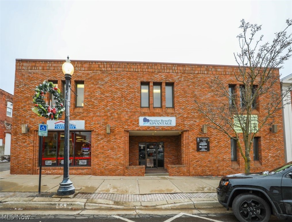 Nice Office Space For Lease in Downtown Ravenna.  Suite C is located on the 1st floor and has approximately 1500 sq ft. with a large open concept office area. 1 restroom, 3 private offices, and a kitchenette/break-room.  Additionally, there is a full unfinished basement, a small parking lot to the rear of the property as well as on-street parking.