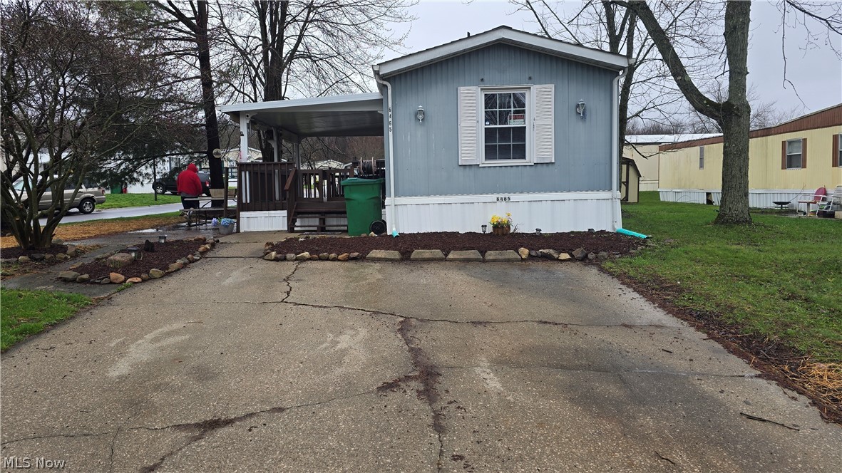 Tucked on a desirable corner lot in Maple Del Manor, this beautifully updated single-wide manufactured home offers comfort and convenience in equal measure. Featuring 2 bedrooms thoughtfully positioned on opposite ends for added privacy, each with its own full bathroom, this home is perfect for flexible living. Enjoy abundant storage throughout, a bright and welcoming layout, and step outside to a lovely deck—ideal for relaxing or entertaining. Located in Ravenna, this home is move-in ready and waiting for its next chapter.

Buyers must be approve by park. There are cameras at this property.