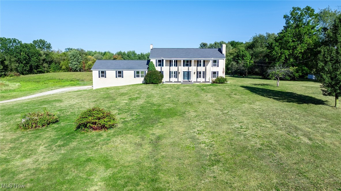 Stunning updated 4777 square foot colonial on over 36 acres in the serene countryside of Randolph Township. Enter through the brand new front door into a grand foyer. To your right enjoy the massive living room with a fireplace. Just beyond the foyer you find the beautiful sprawling eat in kitchen with brand new cabinets and leathered granite counters. Sunny and spacious dining room and family room with a second fireplace flank the kitchen.  Beyond the family room you'll find the first of two Primary Suites, complete with its own sitting room and huge walk in closet, perfect for multi generational living. First floor also includes a huge laundry/mud/craft room (endless possibilities!) and a second full bathroom. Upstairs offers a second expansive suite with multiple closets and an updated en suite bath which includes a  soaking tub and separate shower. Down the hall is another full bath and 2 additional spacious bedrooms, both with great closet space.  Multiple cozy nooks and crannies and incredible storage throughout.  Full unfinished basement with a second laundry area, endless storage and a workshop.  Brand new windows, paint and carpet  throughout the entire home, as well as new front and back doors.  Efficient Geothermal HVAC. Newer roof.  Additional 24x24 outbuilding.  This bucolic property offers rolling hills, woods, a stream and endless wildlife.  Welcome to your forever home!