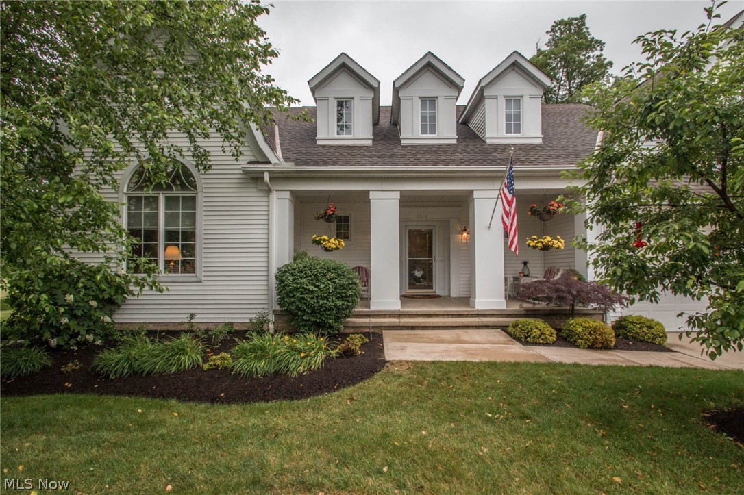 Custom Built Cape Cod, original owner.  Maintenance free living with golf course view. Built in 2001 with over 3000 square feet not including finished lower level which is 1932 square feet. 

First Floor Master Suite with separate vanities, granite counters, soaking tub, walk in shower and walk in closet. Also on first floor is laundry with loads of cupboard space, den which can double as bedroom. Large eat in kitchen with island, maple cabinets, granite counters, stainless appliances and hardwood flooring.  Great room with fireplace, vaulted ceiling and infinite adaptability to any furniture arrangement.  Formal dining room. Second floor offer full bath, 2 guest bedrooms, (one used as craft room w/ built in cabinets).  Loft open to lower level.

Completely finished lower level with solid oak bar, full bath, peninsula fireplace, work shop, exercise room and storage.   Jumbo covered front porch and backyard with trex deck and stamped patio.  Huge side yard unusual for cluster home,
