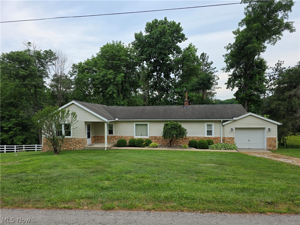 Here is an exceptional offering of a small farm nestled in the hills of Morgan County ready for you to make it your own. The 2 bedroom house with a walk out basement has lots of potential situated on 4.5 acres with a small barn and pasture. The kitchen has been tore out and new drywall has been installed. It is ready for you to design your dream kitchen in this space. There is a small one car garage offering extra storage and room for a vehicle. The house is currently supplied with gas that will not transfer to the new owner. The new owner will be responsible to get propane for the furnace. Also the water that currently supplies the barn will be cut off. Call today to check out this slice of country living.