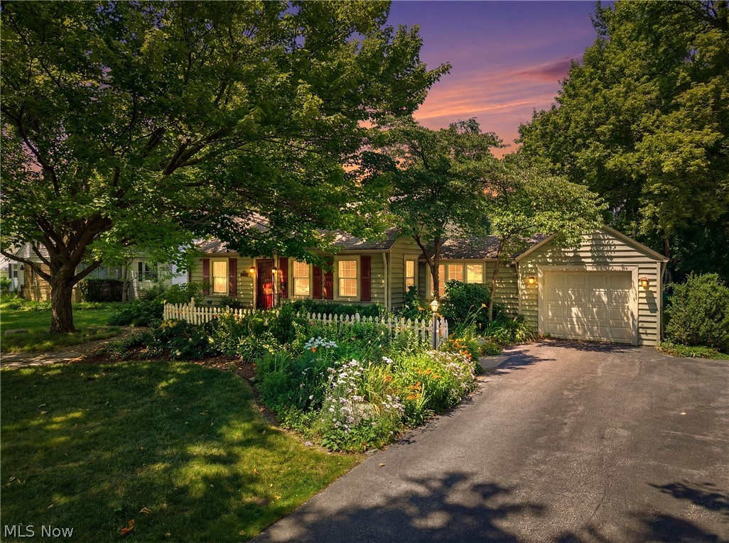 Looking for a Cape Cod home in Bay Village with character, highly rated schools, and an easy commute to Downtown Cleveland? Welcome to 30210 Wolf Road, an early mid-century home on the far western end of Wolf Road. Built just one year before Bay Village's major 1950s subdivision boom, this surviving Cape Cod offers a blend of history, charm, and everyday comfort.
With 3 bedrooms, 2 full bathrooms, and 2,069 square feet, the home also features a flexible upstairs loft and a large unfinished attic with excellent expansion potential. The modern gas fireplace creates a cozy gathering space, while the enclosed three-season porch, shaded front fieldstone patio, and large backyard patio surrounded by mature trees make it easy to enjoy every season. Located directly across from Westerly Elementary, just minutes from Bay High School, Village Rose, parks, Lake Erie, highway access, and a short drive to Downtown Cleveland, this home offers both convenience and community. A pre-listing inspection has already been completed, giving buyers added confidence.