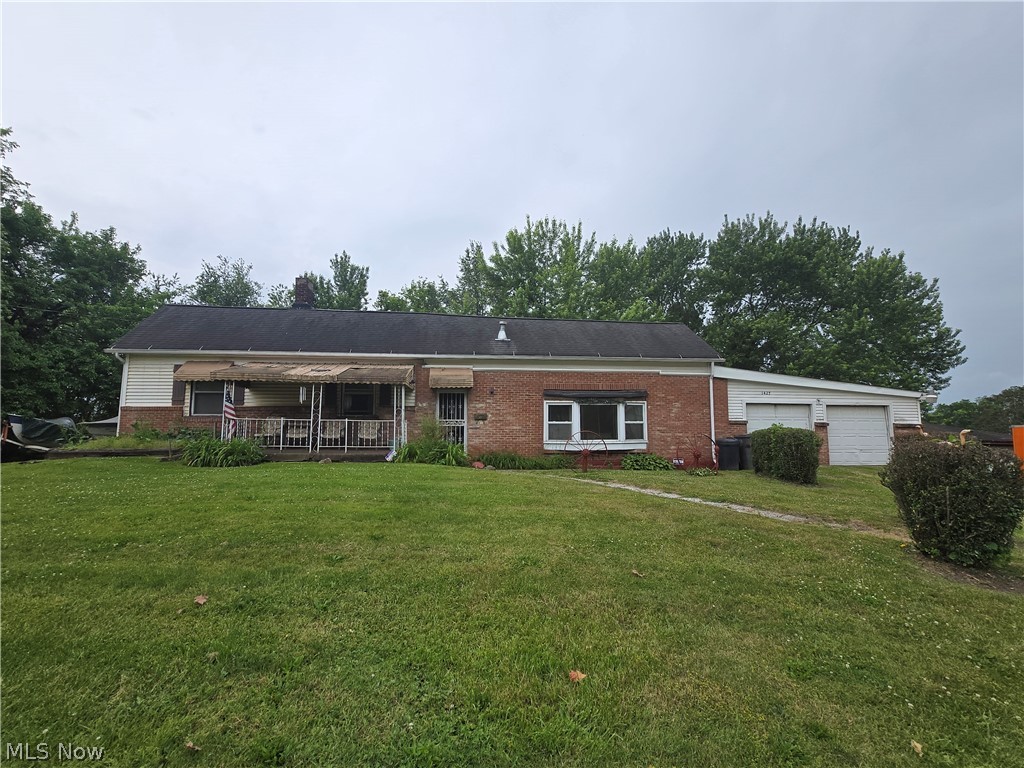 Great starter/family home.  Spacious 3 bedroom home with an additional room in the basement. @ car attached garage with a huge yard.  Newer roof, hot water heater, and 2 new furnaces. This home qualifies for the At Home Grant in the City of Youngstown. Take advantage today!!