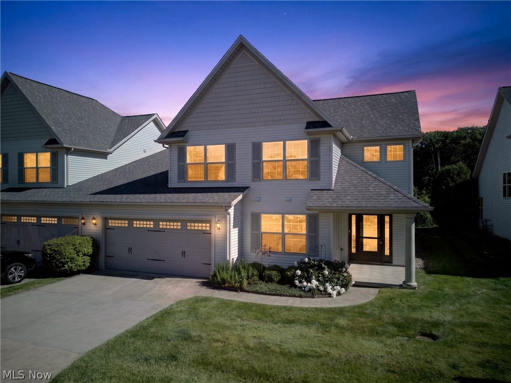 Nestled in a quiet, tucked-away condo community, this stunning 2006-built home backs up directly to a serene, private pond, offering the ultimate peaceful retreat.

Step inside the grand two story foyer and feel the airy, open-concept design pull you in. The heart of the home is the spectacular great room, boasting soaring vaulted ceilings and a cozy gas fireplace perfect for crisp evenings. Entertain with ease in the open eat in kitchen, featuring a generous breakfast bar, dining space, and a newly added exhaust vent just waiting for your dream custom range hood! Natural light pours in through the newly replaced Pella sliding door, seamlessly connecting your indoor and outdoor living spaces. Step out onto the gorgeous new all weather deck (2022) and imagine sipping your morning coffee while overlooking the tranquil water.

The true showstopper is the luxurious first floor primary suite. Designed as your personal everyday getaway, it features a spacious walk-in closet and a spa like ensuite bath with picture windows framing those gorgeous, private pond views.

Working from home? The convenient first-floor office has you covered. A dedicated laundry room, stylish half bath, and an attached 2 car garage loaded with storage complete the main level.

Head upstairs to find two generously sized bedrooms and a full bath, providing plenty of space for family or guests. And wait until you see the bonus space a second floor attic beautifully finished into a massive, oversized closet!

Move right in with total peace of mind thanks to major recent updates: a brand new roof (2024), new furnace (2024), new washer (2023), and dishwasher (2021).

This is low maintenance, high style living at its finest. Don't miss your chance to call this peaceful retreat your own!