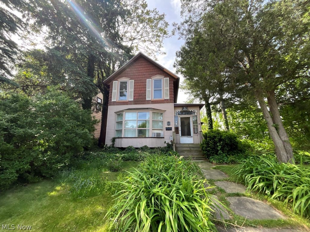"This property features a functional layout with both the first and second floors in move-in-ready condition. Major updates include a 7-year-old roof, updated electrical panel and sockets, and partial bathroom renovations with replumbing completed in one bathroom. The HVAC system is older but fully functional. Additional features include a 1-car garage, rear decks on both levels, and several updated upstairs storm windows while maintaining some original character throughout the home.  the plumbing pipes are reportedly in good condition. Convenient Location On Super Valley Lot-beautiful Brk Room Overlooking Valley As Well As Large Deck. Sold as is