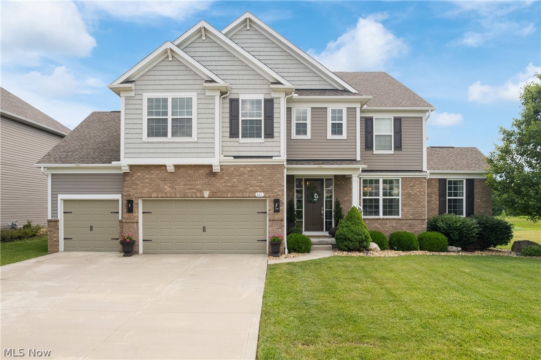 Welcome to 111 Harvester Drive, an exceptional colonial located in The Preserve at Miller's Farm in Revere Local Schools. Built in 2017 and offering over 4,300 square feet of beautifully designed living space, this 4 bedroom, 3.5 bath home combines luxury, functionality and an unbeatable setting backing directly to a nature preserve. The inviting open-concept floor plan showcases elegant architectural details throughout, including coffered and tray ceilings, soaring ceilings, recessed lighting and abundant natural light. The spacious gourmet kitchen features quartz countertops, a large center island, pantry, premium appliances and eat-in area, making it the heart of the home. The adjoining vaulted sunroom with gas fireplace provides the perfect space to relax while enjoying serene preserve views. The main level also offers a formal dining room, private office, versatile den, planning center, half bath and a convenient laundry room with built-in lockers and walk-in closet. Upstairs, the luxurious primary suite serves as a private retreat with a spacious sitting area, spa-like bath with soaking tub, double vanity, separate shower and an expansive walk-in closet. Three additional bedrooms, each with walk-in closets, along with two full baths and a generous loft, provide plenty of space for family and guests. The full basement offers endless possibilities for future finishing, recreation or storage. Outside, enjoy either the side patio or back patio and the beautifully maintained yard overlooking protected green space, creating a peaceful backdrop rarely found in neighborhood living. A 3-car attached garage completes this impressive home. Ideally situated near shopping, dining, parks, and major highways, this move-in ready home offers the perfect blend of luxury, comfort and natural beauty. Don't miss your opportunity to own one of Miller's Farm's most desirable homes.