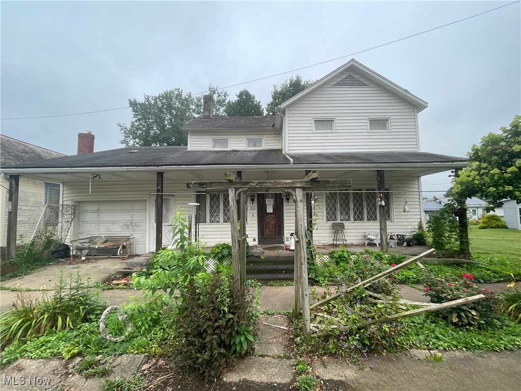 Large 2 story property in Lowell. Home has large rooms throughout and a beautiful kitchen. Nice sunroom and enclosed glass back porch also a 2 car drivethrough garage. Home has first floor laundry conveniently located in the full bathroom. This property has so much potential. Call your Realtor today for a viewing.