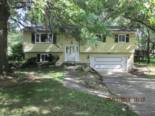 Spacious Bi-level style home with over 1,800 sq ft of living space! Has 4 bedrooms and 2 bathrooms! Has a nice kitchen with plenty of cabinets. Has a charming living room and fireplace. Has a deck and above ground swimming pool perfect for your personal or family relaxation! Must see! Schedule your showing today!