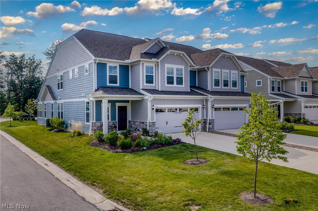 Built-in 2024, this desirable Lakes of Orange townhome is better than new, with the $7,500 initial community fee already paid!!  The home offers easy living with an open floor plan and perfect private spaces. This unit is sited on a large corner lot which adds privacy and a view of nature from many windows.  The foyer welcomes you and guides you into the main living areas.  The kitchen is well appointed with white cabinets, quartz countertops, stainless appliances and an island offering bar seating.  The dining area is open to the kitchen and can serve for casual meals or more formal moments.  The main seating area offers an easy-to-use, artistic fireplace and space for generous seating. The most charming morning room sits at the rear of the first floor, surrounded by windows, and provides calming views of the rear yard. 
The first floor owner's suite is complete with over-sized windows, walk-in closet and an attractive full bath with double vanity and glass-front shower.  A home office is tucked into the back hall when serious business requires focus and privacy.  The first floor laundry room-mud room combo is conveniently located in the back hallway and adds great storage to the first floor.  
The upstairs will surprise you with a fabulous loft at the top of the stairs.  The space could be utilized in a multitude of ways depending upon your lifestyle and needs.  Two charming, well-sized, carpeted bedrooms have walk-in closets and share a crisp, well-designed full bath.
This home is close to the walking trail which connects Lake Balaton to the original area of Lakes of Orange and provides access to the amenities of the community--pool, tennis court, playground and community clubhouse.   
Lake Balaton is convenient to everything--highways, medical facilities, Orange Schools, shopping and restaurants.  Enjoy the epitome of easy living!!