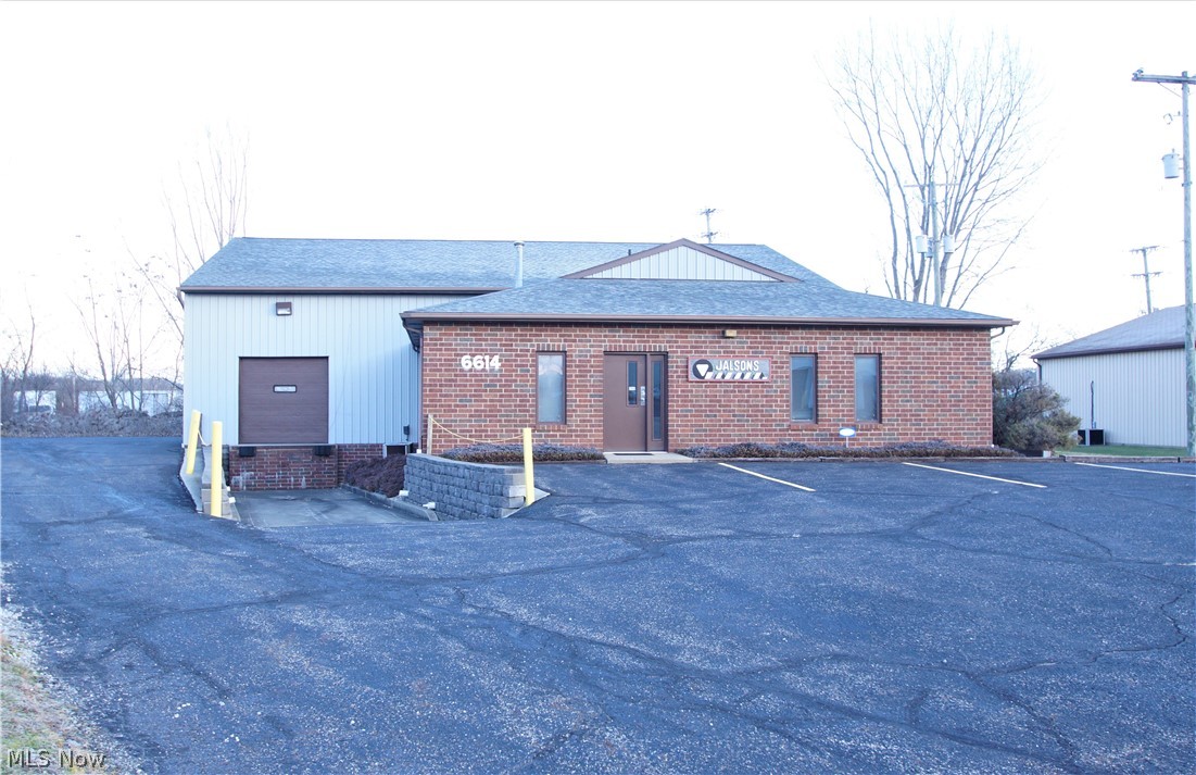 Pristine Warehouse and Office Complex zoned I-1 and located in Jackson Twp. off Portage Ave. NW to Promway Ave. NW to Promler Ave. NW to Greenfield Cir. NW. Quality built building with approximately 4,096 sf. There is 2,676 sf of Warehouse space and a 300 sf Mezzanine space, 1,420 sf of Office Space situated on .62 acres on a cul de sac. Warehouse space has an 8 ft. loading dock, 10 ft. overhead door with garage door opener, 12 ft. ceiling, 3-phase electric (400 amps) and radiant heat. Office space has a receptionist area, two spacious work rooms, three offices, kitchenette, large storage closet, two restrooms and blinds throughout the office area. Building has a security system. Roof replaced 2019 and HD 18G front door replaced in 2018. Office furniture and equipment are negotiable.  Quick access to I-77, restaurants, shopping and CAK Airport.