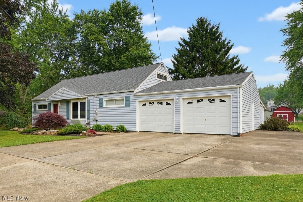 Welcome to this Beautiful Home Located in a desirable area within the Louisville School District, a quiet neighborhood area with close proximity to local amenities. A spacious 4-bedroom home situated on over a half-acre lot offers ample space for everyone to enjoy both indoor and outdoor festivities/activities. The large, covered porch is perfect for taking in the serene backyard. Enter into the welcoming living room with a lovely bay window and cozy feel. The large step-down family room offers a great space to gather and enjoy Sunday Football or Friday Game Nights. The eat-in kitchen is perfect for Holidays and gatherings with the step-down attached dining room. The master bedroom, additional bedroom/first floor laundry and bathroom with walk-in shower finish the first floor. Upstairs you'll find two more bedrooms one perfectly sized and one large oversized along with two big dormer spaces that offer great storage. A full basement with nice workbench area, laundry and potential for additional bathroom.  An oversized heated Garage and large driveway lend way to boat/camper parking. There is endless potential in this very loved and very welcoming home. See it before it's gone, it won't last long!!!

Tax Special Assessments: MUSKINGUM WATERSHED = $2.00 annually
