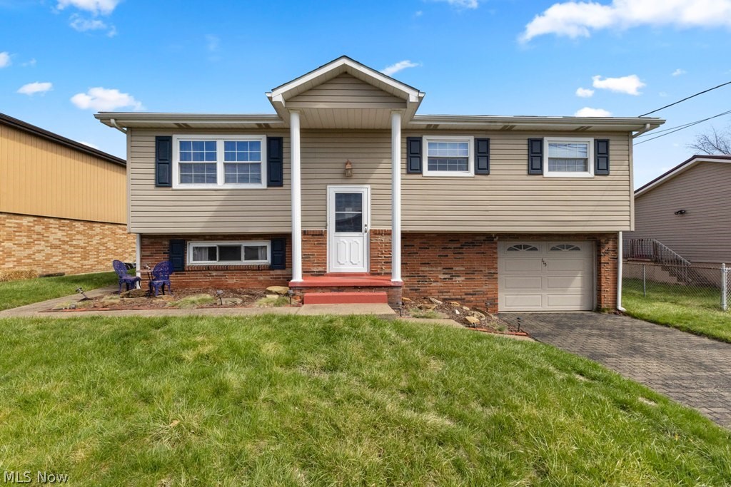 3-bedroom, 2-bath split-entry home located in a well-established neighborhood close to all amenities. This home features a spacious living room and a fully equipped eat-in kitchen with direct access to a large rear deck—perfect for outdoor entertaining—overlooking a private, level backyard. The lower level offers a comfortable family room, a recenntly renovated ¾ bath, a generous laundry/utility room, and convenient access to the integral garage.  14 month HOME WARRANTY included.