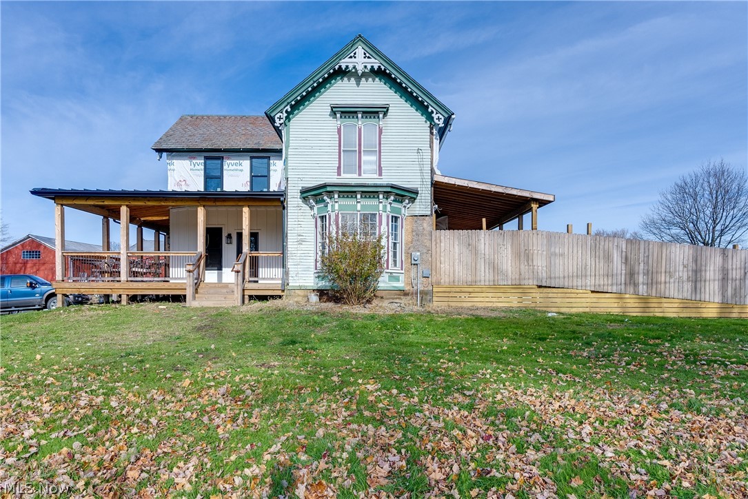 Do not miss your opportunity to add your finishing touches to this newly remodeled farm house featuring 4 bedrooms & 5 baths! Situated on just over 31 acres of pasture and woods, this home has so much to offer. Outside is a fenced pasture area that is 9 acres with a creek running through, 11 acres wooded, additional fenced area in backyard, a raised garden, a pond, a large bank barn, an apartment above the garage that was renovated in 2016, & FREE GAS! Inside are 9 foot ceilings & so many updates already done for you! The foyer has pretty ceramic tile flooring, laminate flooring throughout the living room & family room, & a beautiful stone gas fireplace. The eat-in kitchen offers brand new white cabinetry, ss appliances, new lighting, & has new sliding doors that lead you to the wrap around deck! Off the kitchen is the first floor laundry room that has plenty of space & also serves as a pantry. The half bathroom on the first floor features an original cast iron sink that was refinished