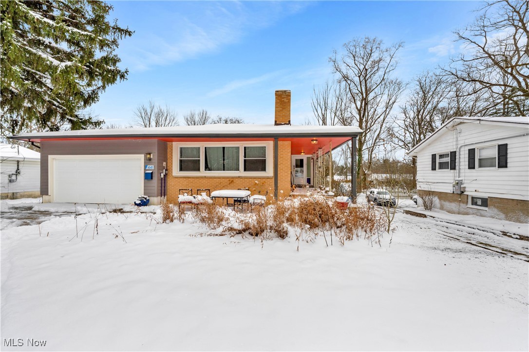 Welcome to this impressive 4-bedroom, 2 full-bath home offering over 3,600 square feet of beautifully designed living space in the heart of Oberlin, Ohio. Rich hardwood floors flow throughout, while large windows flood the home with morning sunlight and rovide serene views of the backyard, creating a bright and inviting atmosphere. Outdoor living truly shines with an expansive 1,800-square-foot wrap-around deck perfect for entertaining, relaxing, or enjoying the surrounding setting. Inside, spacious rooms offer flexibility for today's lifestyles, while the walk-out basement, complete with a wood-burning fireplace, is ready for your finishing touches and provides excellent potential for additional living or recreational space. A two-car garage adds everyday convenience. This well-maintained home boasts numerous quality upgrades, including Carrier dual-zone furnaces with central air, whole-home Aprilaire humidification, and UV filtration for year-round comfort. Additional improvements include a new roof (2022), new concrete driveway, a completely rebuilt chimney, LVT flooring in the kitchen and both bathrooms, and new French doors in the patio room that open directly from the dining room. Two wood-burning fireplaces add warmth and character throughout the home. Efficiency and peace of mind are enhanced by an energy efficient tankless water heater and a fully replaced 4" cast-iron drainage system upgraded to PVC. HardiePlank siding, soffit and fascia with custom color (Mink and Red Tomato) with a 30 year warranty. Ideally located near Oberlin College, downtown shops, dining, and parks, this exceptional home blends generous space, thoughtful updates, abundant natural light, and classic small-town charm. Schedule your private showing today and experience all this remarkable home has to offer.