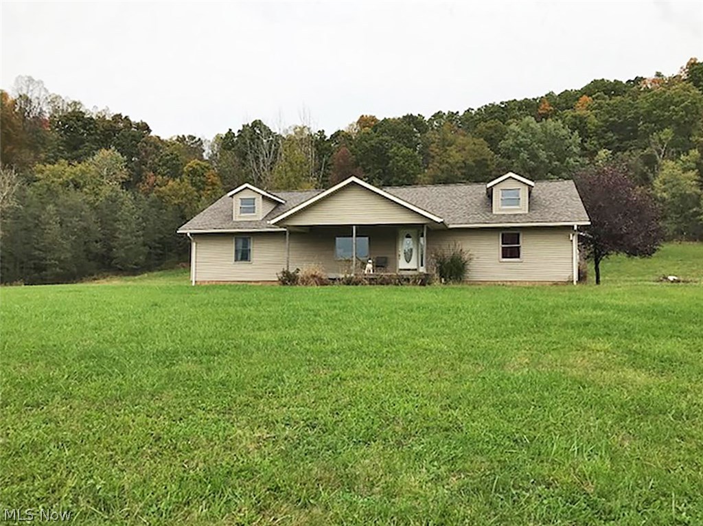 Spacious 3 bedroom 2 bath ranch home on 13.6+ acres.  Large living room and master suite with a tub and separate shower.  Extra large 3 stall attached garage with access to full basement.  Nice large yard area with horse barn and fenced in area for the horses. Property will have an easement to use the existing paved drive.  Property will need its own water well drilled.  Property to be surveyed and expected regional planning approval for new lot lines.