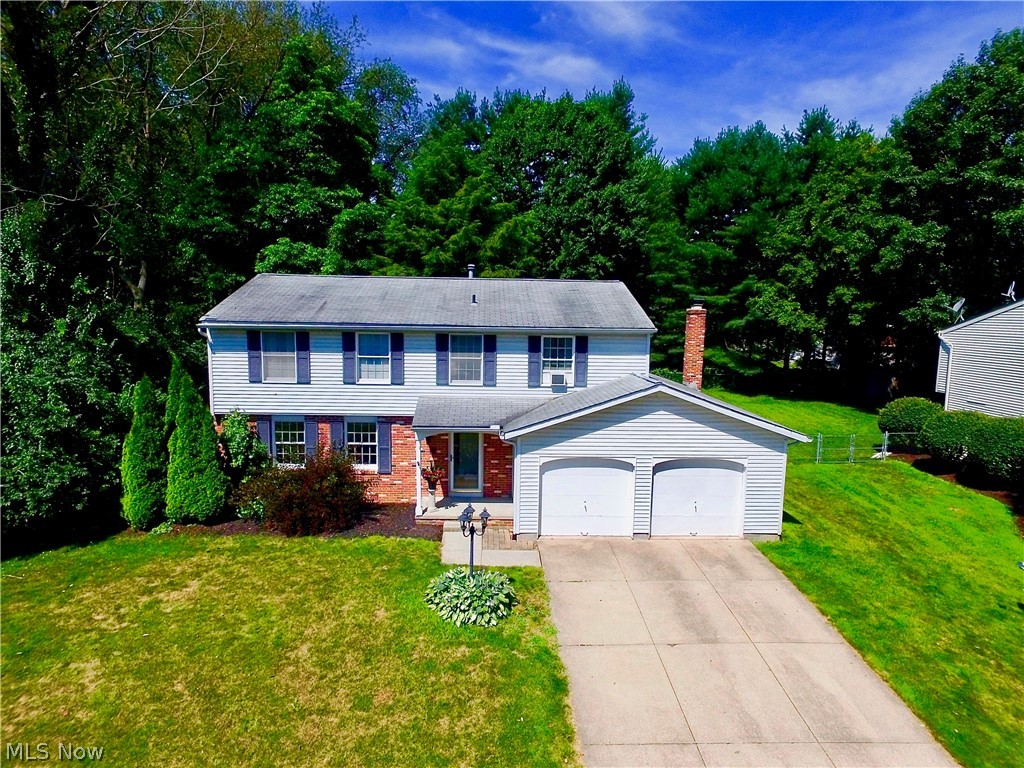 "I would like a house with plenty of space for entertaining guests and I want it to have a nice fenced in backyard for the pets." We have all heard or said this before. Well this is it!!! A great home in Munroe Falls with 4 Beds, 2.5 Baths including an updated master bathroom as well as a sizable walk in closet. The new home owners will enjoy having a finished basement where they can relax or perhaps enjoy a hobby. The backyard is great for having a cookout with friends and family... I know from experience! With the attached garage it will be a little bit easier for the new home owners to brave the cold snowy Ohio winter when they aren't having to brush their cars off every morning. Don't miss your chance to see this GEM today!