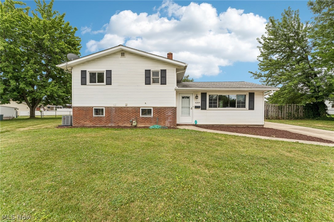 Welcome home to this 4 Bedroom / 2 Full Bath Split Level home w/ 2 Car attached Garage tucked away on a low traffic cul-de-sac in Brook Park. Situated on a .35 acre lot this home features a fenced yard (great for pets), shed, wood deck, above ground pool, and basketball hoop. The home has many features that make it the perfect place to call home. The spacious Living Room has high ceilings, luxury vinyl plank flooring, and a large ceiling fan. The updated Kitchen has quartz counters, slate stainless appliances (included), and newer cabinets and flooring. Adjacent the Kitchen is the dining room that has plenty of windows for lots of natural light. Upward to the second floor you’ll find plenty of room for everyone to spread out, with four bedrooms, including one that could also serve as an office. The upstairs main bathroom has a tub/shower and large linen cabinet. Down the hall and up a few steps is a private extra-large Owner’s Suite with a spacious walk-in closet. On the lower level there is a Family Room with wood-burning stove. Also on the lower level is another full bathroom with walk-in shower, laundry room, and utility area. Just off the lower level is a door that leads to a spacious workshop and the attached garage. Several high-ticket mechanical updates include newer Furnace, AC, Roof, and H2O tank. The home is conveniently located near John F. Kennedy Park featuring walking paths, playground, baseball fields, and picnic pavilion. Just around the corner to the Airport, shopping, and major highways. Close to Brook Park Recreation Center with fitness center and water park. The City of Brook Park is attracting new investments including the upcoming new Browns domed stadium and associated surrounding entertainment venues.