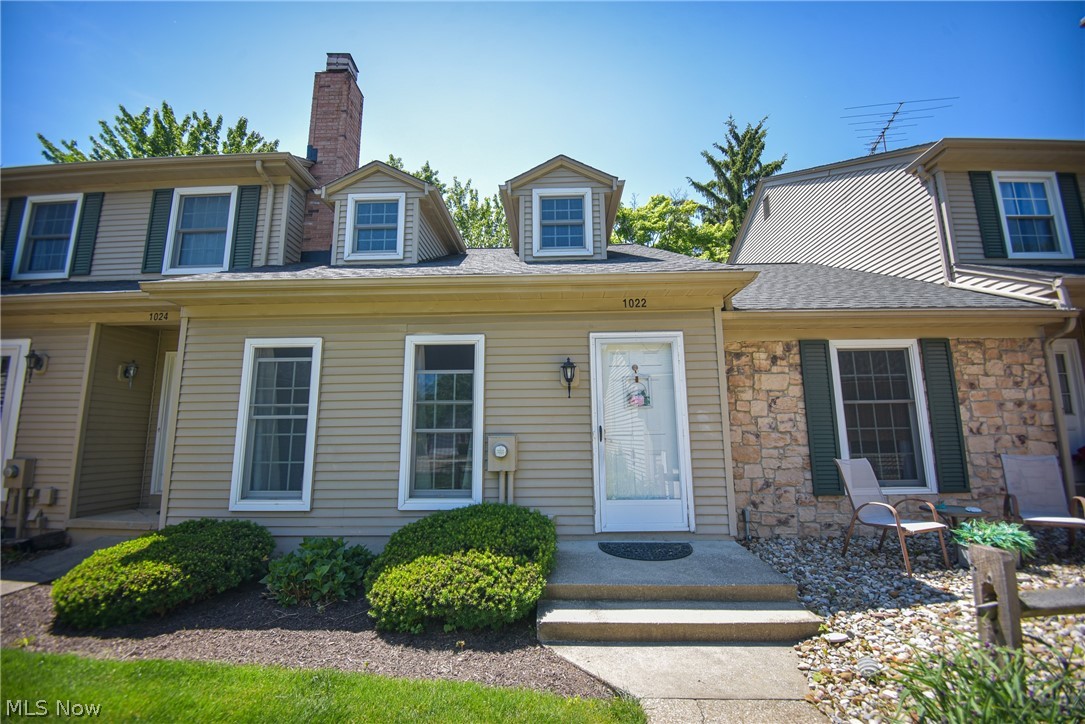 Welcome home to this charming 3-bedroom, 2 full-bath Cape Cod townhouse offering low-maintenance living and a convenient Medina location! A front patio welcomes you to the home, while a detached one-car garage provides additional storage and parking. Step inside to a spacious living room featuring a cozy fireplace, perfect for relaxing evenings at home. The living room flows into the dining area and spacious eat-in kitchen, which offers abundant cabinet and countertop space, a dedicated breakfast area, and a sliding door leading to the patio. The main level includes a primary bedroom with a walk-in closet, a second bedroom, a full bath, and a convenient first-floor laundry area, providing the option for true one-floor living. Upstairs, you'll find a large third bedroom that could also serve as a private primary suite, complete with two closets and a full bath. Outside, enjoy the back patio with a wood privacy fence, creating a comfortable outdoor space for entertaining, relaxing, or enjoying your morning coffee in a private setting. Ideally located near the Medina Square, restaurants, shopping, parks, and everyday conveniences, this well-maintained home offers comfort, flexibility, and a fantastic location. Don't miss your opportunity to make it yours!