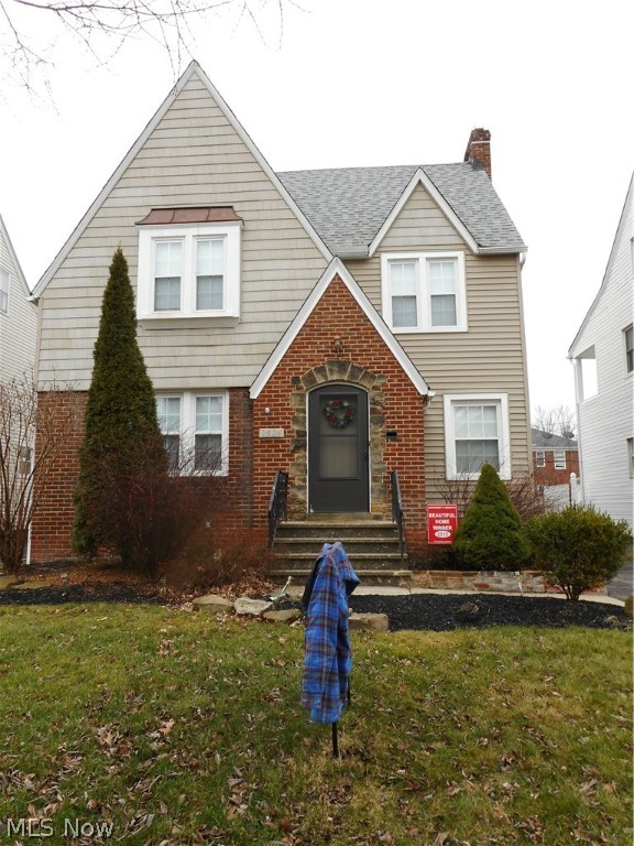 Previous winner of University Hts. beautiful home award. Solid 4 bedroom home. Newer kitchen cabinets and laminate floor. Most windows are replacement. 
Move-in condition. Younger 2 car garage. Parking for extra car or patio area in rear. Close to Cain Park, shopping, University Circle cultural hub and downtown Cleveland.