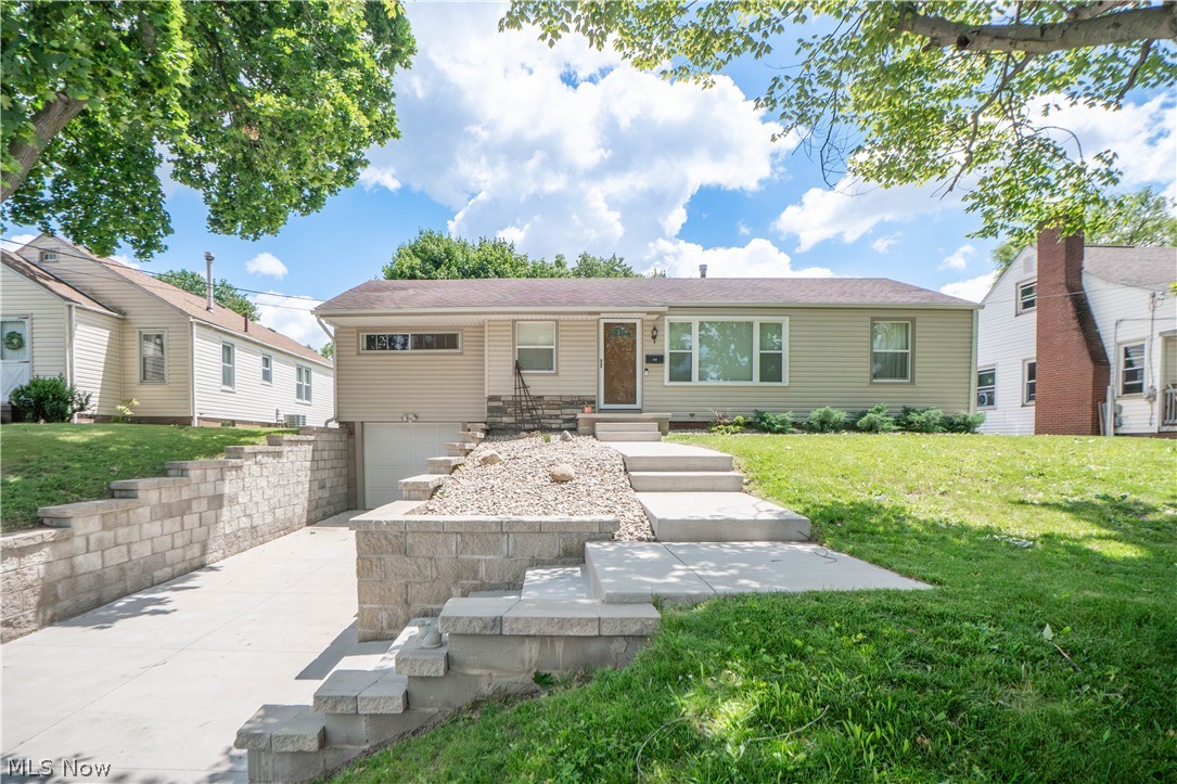 Enjoy comfortable single-floor living in this charming Perry Township ranch! A beautiful set of concrete steps welcomes you to the front entry, opening into a bright and airy living room filled with natural light from the large picture window. The living room flows nicely into the dining area, creating an easy layout for everyday living and gathering. Just off the dining space, the kitchen offers functionality and convenience, with appliances included for the next owner. Continue into the cozy family room featuring warm wood walls, a ceiling fan, and direct access to the backyard, making it a comfortable place to relax or entertain. Three bedrooms are conveniently located on the main floor, along with a full bathroom featuring a tub/shower combination. The lower level provides even more usable space with an unfinished basement area offering plenty of storage, laundry space with washer and dryer hook ups, a second full bathroom with shower, and access to the garage. With its ranch layout, practical floor plan, and convenient location in Perry Local Schools, this home is ready for its next chapter!