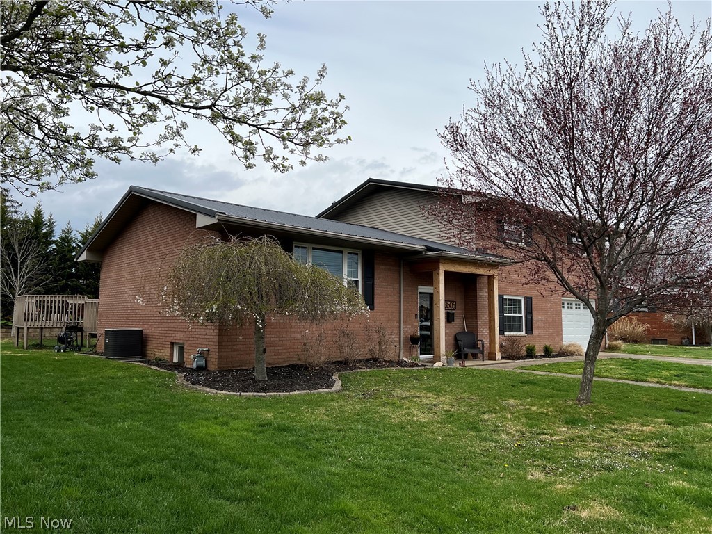 This beautiful UPDATED well maintained home with an open concept, perfect for entertaining. 4 Bed 2 1/2 Bath located on a dead end street.  Custom kitchen cabinets, all new bathrooms, private back deck with a built in cabinet wired for a TV. NEWer metal roof, windows and HVAC! This home is MOVE IN READY!