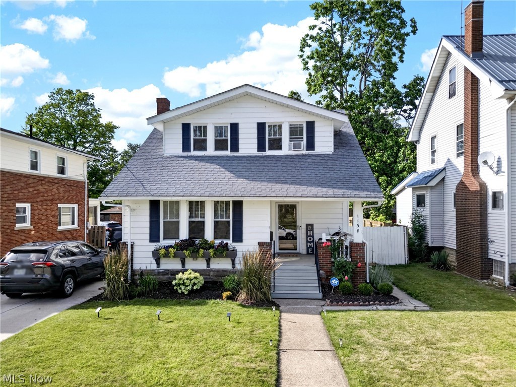 Are you looking for a home that combines old-world charm with modern updates near Lake Erie? You've found it! Beautiful original woodwork, built-in cabinetry, and solid wood doors showcase the character and craftsmanship that are nearly impossible to replicate today.

The updated kitchen features newer cabinetry, sleek black hardware, a subway tile backsplash, and stainless steel appliances. A rare first-floor half bath adds everyday convenience.

Upstairs, you'll find three bedrooms and a full bathroom featuring a clawfoot tub and dual vanity. The basement offers ample storage space, an updated full bath, and has been fully waterproofed with a sump pump and battery backup for added peace of mind.

Outside, the home offers wonderful curb appeal with charming window boxes, an inviting front porch, while the private, fully fenced backyard creates the perfect retreat with plenty of space for entertaining, gardening, pets, or simply relaxing.