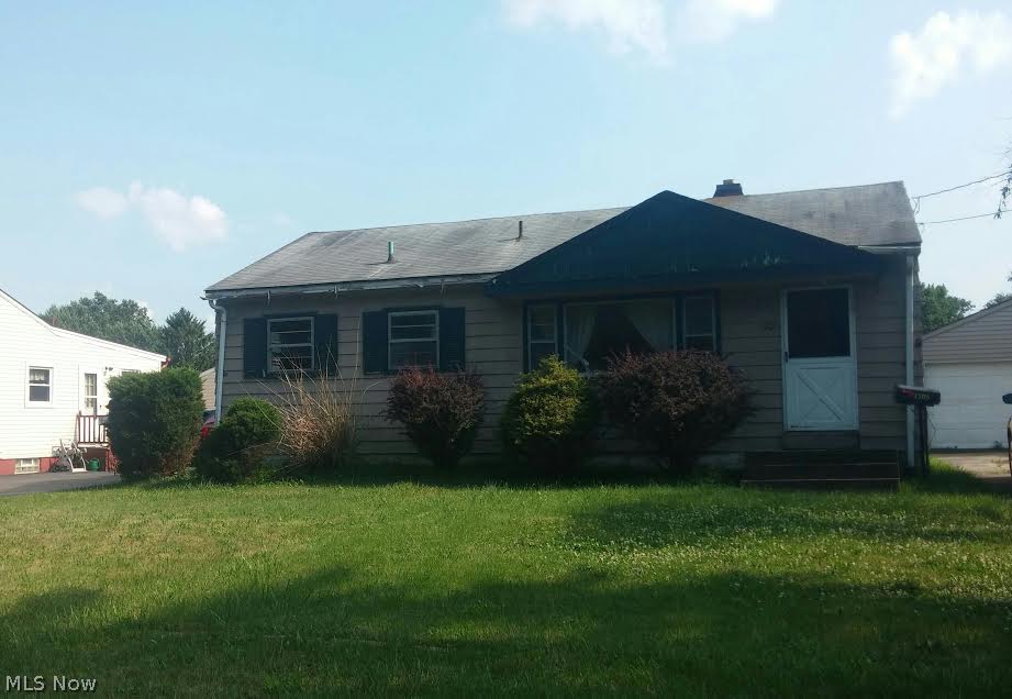 Breathe new life into this cozy 3 Bedroom Home! What an excellent real estate investment opportunity in Boardman Township at such an affordable price! Large living room with built-in shelves and hardwood floors underneath carpeting. Eat-In kitchen with hook up that allows for an electric or gas stove. Plus 3rd bedroom can be used as a dining room. Home is being sold in "AS-IS Condition. Bring Offers.