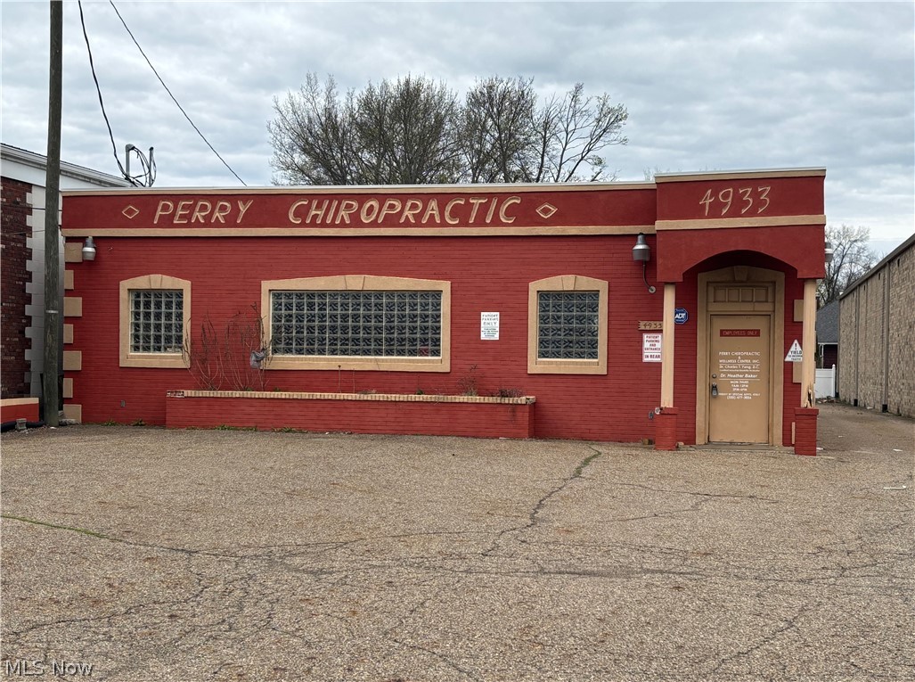 Prime commercial opportunity in Perry Township with Aqua Ohio water supply. Unlock the potential of this high-visibility, free-standing commercial building at 4933 Tuscarawas St W, Canton, OH 44708. Situated on two parcels with 2,520 +\- sq ft of versatile space, this property is ready to support your business vision. Ample parking ensures convenience for both clients and employees, while the flexible layout includes multiple office workspaces and 3 bathrooms, perfect for a variety of business uses. Whether you're expanding, relocating, or launching a new venture, this location offers incredible exposure and easy access to major roadways.