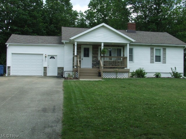 Great 3-bedroom Ranch, totally updated, includes 3 FULL baths, 1st FLOOR LAUNDRY, Bonus room, partially finished basement, attached 2-car (tandem) garage, all stainless steel kitchen appliances plus washer and dryer - all on ALMOST HALF ACRE!!!!  Kitchen has been updated with granite counters, cabinets painted white, beautiful laminate flooring which continues into the dining area and living room.  Master bedroom suite includes full bath, large closet, and stackable washer and dryer.  Basement is partially finished with 3rd full bathroom, fireplace, divided into two rooms with some drywall, one side currently used as home theater, but needs carpet and ceiling.  There is attached, 2-car tandem garage that leads to large backyard with shed and cement pad for picnic table in addition to the deck on back of house.  Driveway is long and double wide if you need additional parking.  Property has well water with 2-month old softener, city sewer.  There's even a bonus room on "second floor" tha