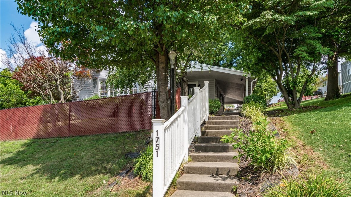 Welcome to 1751 Blaine Ave! Nestled in one of Cambridge's most desirable neighborhoods, this well-maintained ranch offers comfort, convenience, and more finished living space than meets the eye. Located just minutes from Southeastern Med, Cambridge City Park, the YMCA, shopping, dining, and schools, you'll love the location as much as the home. Recent updates, including a newer roof and furnace, provide added peace of mind. The main level features beautiful hardwood floors throughout the living and dining rooms, two spacious bedrooms, and a full bathroom. Downstairs, the finished basement creates the perfect space for entertaining or relaxing with a large family room, custom bar area, an additional bedroom, a full bathroom, and a half bath. Step outside to enjoy the inviting wrap-around porch—perfect for morning coffee or relaxing evenings. With three bedrooms, two full baths, one half bath, abundant finished living space, and an unbeatable location, this move-in ready home offers exceptional value at $199,000. Schedule your private showing today!