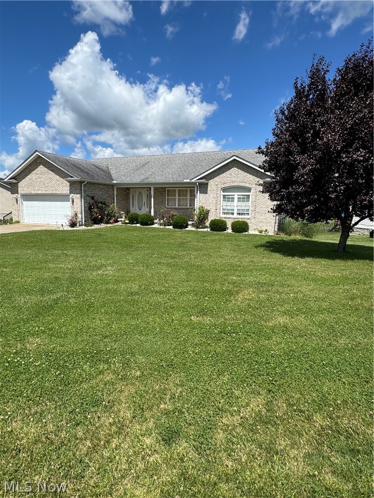 Hello! Welcome to this beautiful custom built ranch home. Open concept with loads of family or private space. 3 Bedrooms, 3 bathrooms, eat in kitchen, beautiful front porch area.  The vaulted living room features a gas corner fireplace. The large eat in kitchen is a chef’s dream. Loads of cabinets and the kitchen has real hardwood floors! Oak cabinets with pull out drawers a window above the kitchen sink for a beautiful view of the neighborhood pond. Appliances will stay!  The three bedrooms have plenty of storage and plenty of space they seem large with the perfect space. The main bedroom has an attached on suite with a tub, separate shower , sink vanity and closet for towels and accessories. A separate laundry room as you walk through to the nice sized double car garage. Just off the kitchen is an enclosed sunroom with multiple windows for light maybe perfect for those plants or a play area for the children.  This sunroom leads to a deck which leads to the backyard area. The home has a full pored wall basement with French doors and several windows for light. This area also has a full finished bath. The rest of the basement is just waiting on your ideas! The French doors lead outside to the backyard area. The front of the house has great curb appeal with the long front porch and hooks ready for that porch swing. Make your appointment today to view this listing.