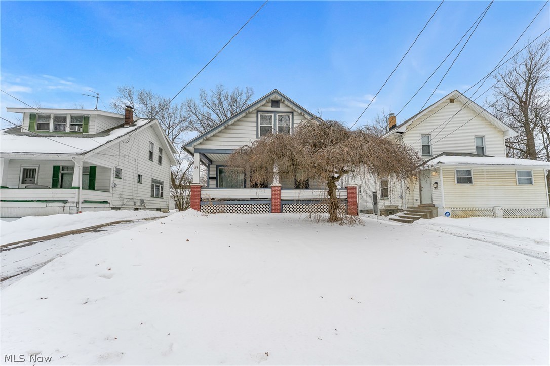 Opportunity is knocking at 34 N. Bon Air, and savvy investors wont want to miss this one.  This charming 3 bedroom, 1 bath home in Youngstown's West side presents an exceptional chance to build equity, generate income, or launch a thriving Airbnb venture.  The property comes partially furnished, giving you a head start on getting things up and running without the hassle of starting from scratch.
One of the stand out features is the oversized 2 car garage-true rarity that adds tremendous value and versatility, whether used for storge, a workshop, or additional covered space, this garage is a major bonus.