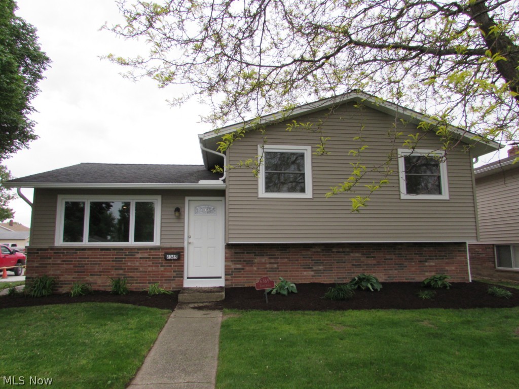 Just walk-in and you will fall in love with the absolutely fabulous 3BR/1.5BA Split Level! Almost a new home with all the high-end finishes you could dream of in your next home. Open floor plan with granite Breakfast Bar with decorative drop pendant lighting overhead overlooking Great Room (which is perfect for entertaining friends and family). Gourmet Kitchen with all new Solid maple cabinets (with soft close), granite counter tops, and European stone texture flooring. All brand new Stainless steel kitchen appliances including Samsung refrigerator with french doors, Gas range with built-in GE microwave above, and GE Dishwasher (with stainless inside). Full and half Glamour baths with granite counters, new cabs , and hardware. Main bath has all new ceramic surround and refinished tub/shower. All refinished hardwoods on main and upper floors. All new paint, lighting, and trim. Brand new driveway and Garage Door. Home has all new vinyl siding, gutters/downspouts, R21 Insulation, and land