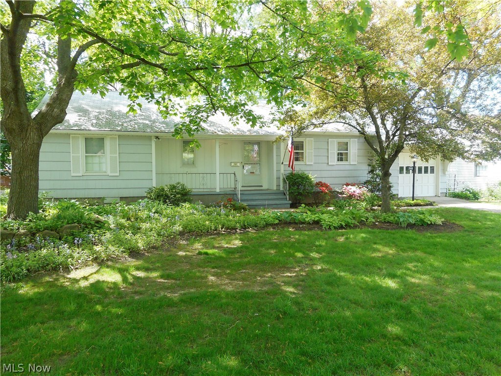 Rare opportunity for one floor living.  This lovely 3 bedroom, 2 full bath Ranch home is situated further back from the street.  The large front yard and front porch welcome you as you enter the living room accented by a wood burning fireplace, built-in shelves and a large picture window with views of the fenced backyard.  There are hardwood floors under the living room, dining room, hallway and bedroom carpeting. In addition to the living room fireplace the lower level is finished and also offers a fireplace, as well as a full bath with walk-in shower.  A back porch, shed, alarm system and a newer furnace (2005) are added bonuses.  Don't wait, call to see this home today!