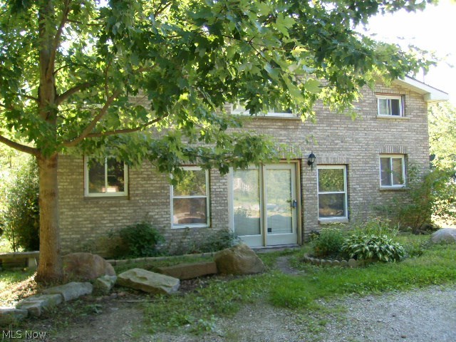 Unique, must see Lake Milton property located close to state park, lake, golf course and I - 76. Fabulous private yard and  quite street, large open floor plan. Great for year around living or a perfect weekend getaway home ! Call today for your personal tour.
