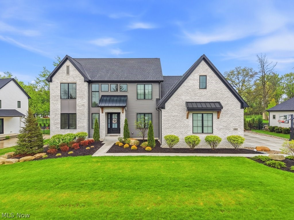 This 2024 Edgewood Builders home showcases modern finishes, thoughtful design, and an exceptional layout throughout. Upon entering, you are greeted by soaring ceilings, wall-to-wall windows, and beautiful views of the private backyard. Engineered hardwood flooring flows throughout the entire first floor, adding warmth and continuity. The kitchen is truly high-end, featuring quartz countertops, Bosch appliances, custom cabinetry, and a spacious walk-in pantry. The first floor also includes a half bathroom, private office, mudroom, laundry room, and a luxurious first-floor owner's suite. The owner's suite offers lighted tray ceilings, a tiled walk-in shower, dual vanities, and a large walk-in closet. The second floor features a generous loft area along with three additional bedrooms. One bedroom includes its own en-suite full bathroom, while the two secondary bedrooms are connected by a Jack and Jill bathroom.
The basement is unfinished but offers raised ceilings and approximately 2,190 square feet of additional space ready to be finished for even more living area. Outdoor living is equally impressive with a stunning covered patio featuring a gas stone fireplace overlooking the private backyard. The oversized 3-car garage provides ample storage and room for even the largest vehicles. An additional standout feature includes custom motorized blinds throughout the home. The finishes and craftsmanship in this home are unmatched, all situated in a quiet neighborhood that offers privacy while still being conveniently close to shopping, I-71, and just 30 minutes from Downtown Cleveland. Also located in the highly coveted Highland School District and Hinckley Township, this home offers everything and more!