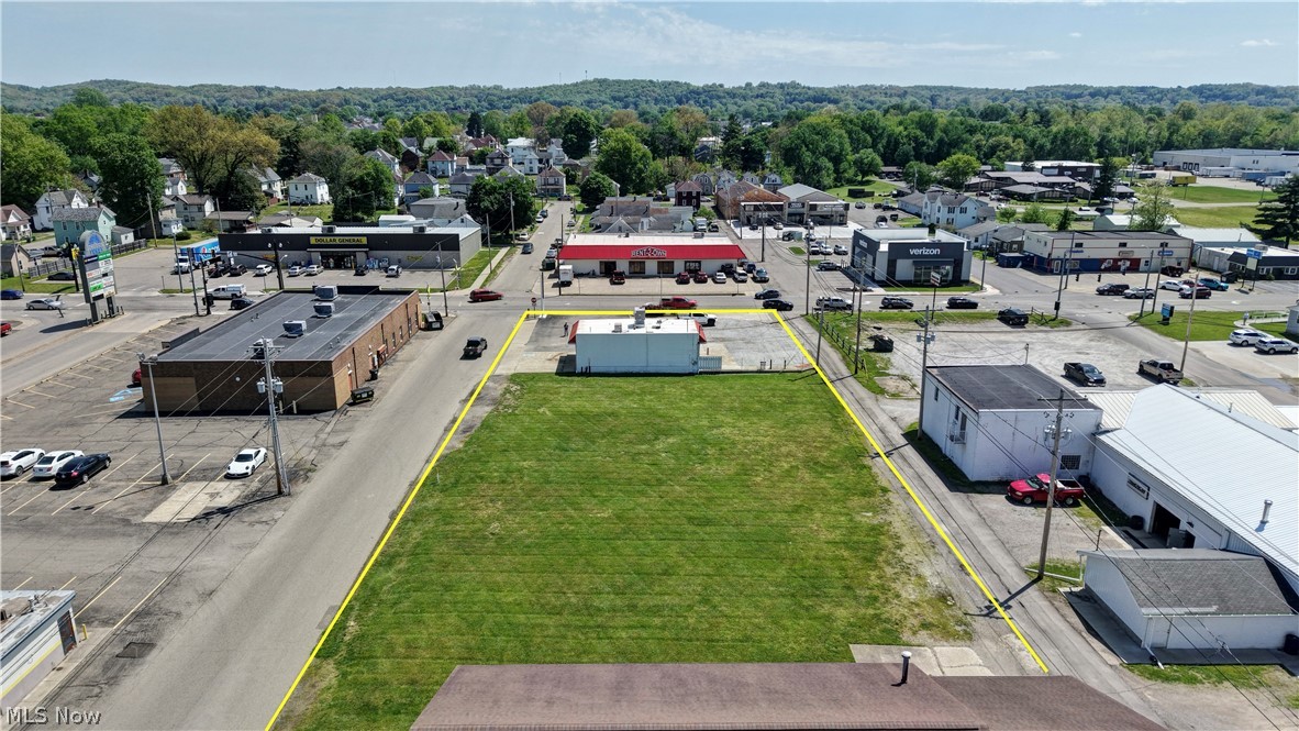 Online Only Auction Begins Ending Monday June 22 at 6:00 PM. Constructed in 1996 this building comes equipped with updated utilities, a clean NFA tag and 2 restrooms. Would make an excellent office or retail space for someone in search of high traffic volume as this is one of the busiest streets in Coshocton city. Add to that the 4 vacant city lots with public utilities, the option of expanding is there. The 4 lots are each .13 acres and are pancake flat and located along Vine St. behind the main building. This property will be offered in a multi par setting allowing the buyer to choose his own combinations.