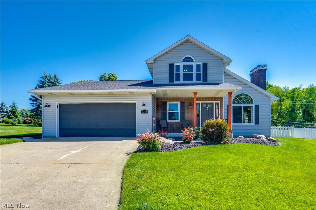 Welcome home! This beautifully updated 3-bedroom, 2.5-bath Colonial is nestled on a large lot at the end of a quiet cul-de-sac — offering privacy, space, and a yard you'll absolutely love. Fully fenced and ready for entertaining, kids, or pets, the outdoor space is a true highlight, complete with two separate wooden decks perfect for relaxing or hosting. Inside, you'll find a thoughtfully designed layout with a first-floor master suite featuring carpet, French doors opening directly to the deck, a private bath with a garden tub, a shower, and a spacious walk-in closet. The first-floor laundry room adds everyday convenience, along with an half bath with tile flooring. The heart of the home flows beautifully — a bright living room with a gas fireplace and brick surround opens to a large dining area with laminate flooring, then into the family room and a well-appointed kitchen featuring wooden cabinetry, Corian countertops, and laminate flooring throughout. Upstairs, two generously sized bedrooms, each with double closets, share a hall bath with a double vanity, tub/shower combo, linen closet, and laminate flooring. Updates include a new roof 2017, windows 2020, furnace/AC and hot water tank in 2021. Don't miss your chance to see this beautiful home; schedule your showing today.