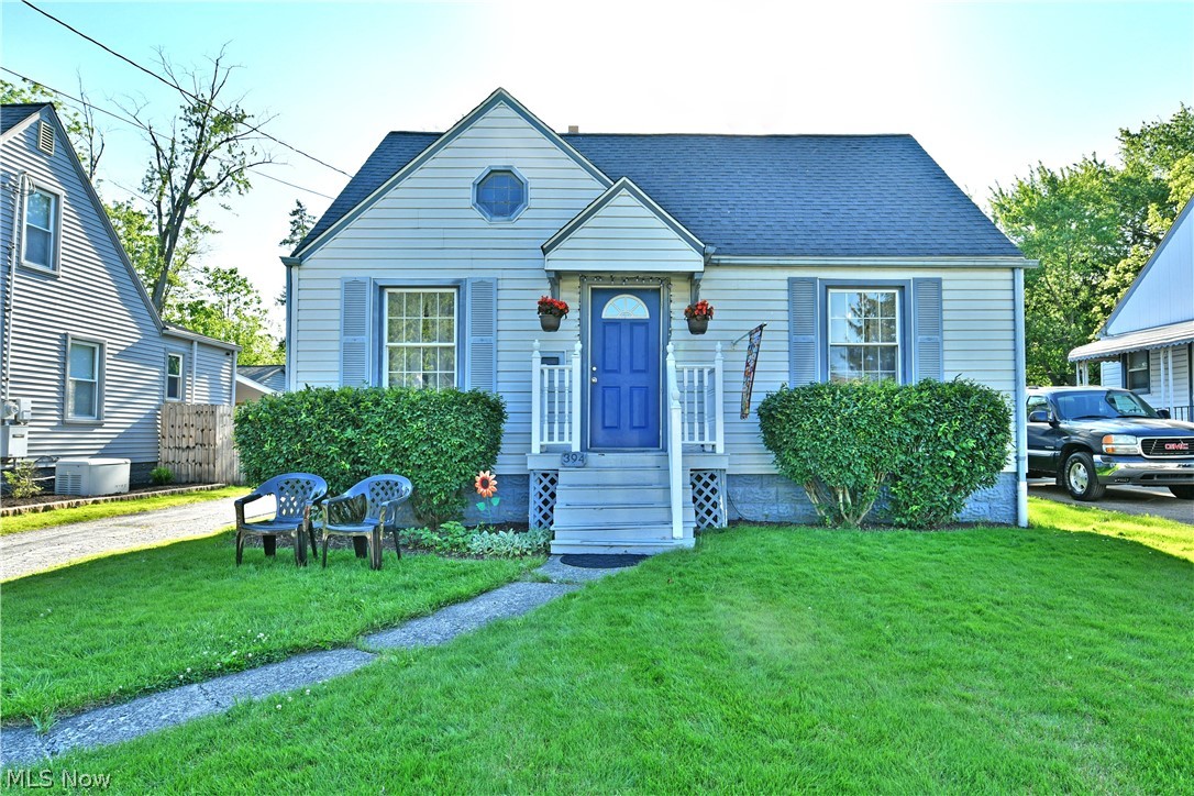 Cute, colorful and cozy, this endearing Warren Cape Cod will have you falling in love with its comfortably inviting living space and a great backyard, ready to enjoy the summer in! From the moment you spot its bold, purple entry door and accompanying hues, it’s easy to see the curb appeal standout that sets the tone from first glance. The blacktop drive extends out to find a single car detached garage that joins a fenced-in backyard. Step inside to find a welcoming living room, boasting hardwood flooring and multiple windows. Around the corner, faux brick trim leads into the combined kitchen and dining areas. Brightly lit and hosting an array of available storage, you’ll find everything you need plus a side entry door leading to the backyard. Enjoy the spacious family room with its built-in shelving and staircase access. Completing the first floor, a master bedroom is joined by a gracious full bath and its quaint vanity. Upstairs, a pair of additional bedrooms bring the total to three, with the larger offering a unique bonus nook, perfect for lounging with a view. The full basement provides both laundry and utility services. New furnace and air conditioning installed in 2025.
