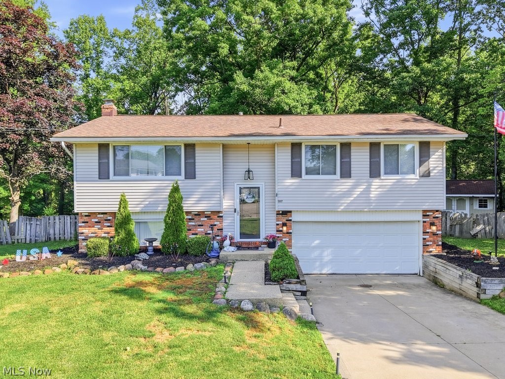 Move-in ready bi-level tucked away on a quiet cul-de-sac in desirable Northfield. This well-maintained home offers 3 full bedrooms and a full bathroom on the upper level, complemented by newer LVP flooring throughout the bedrooms. The lower level features an additional living room, full bathroom, and updated LVP flooring—perfect for entertaining, a home office, or guest space. Enjoy peace of mind with newer appliances (2021) and a newer roof. Step outside to a private, wooded backyard oasis complete with a brand-new pool installed in 2024, ideal for summer relaxation. A two-car garage adds convenience and storage. With thoughtful updates, flexible living space, and a serene setting, this home checks all the boxes.