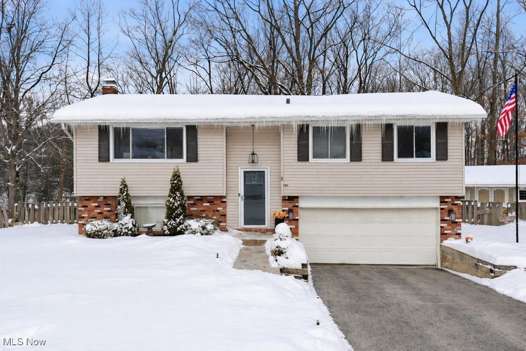 Move-in ready bi-level tucked away on a quiet cul-de-sac in desirable Northfield. This well-maintained home offers 3 full bedrooms and a full bathroom on the upper level, complemented by newer LVP flooring throughout the bedrooms. The lower level features an additional living room, full bathroom, and updated LVP flooring—perfect for entertaining, a home office, or guest space. Enjoy peace of mind with newer appliances (2021) and a newer roof. Step outside to a private, wooded backyard oasis complete with a brand-new pool installed in 2024, ideal for summer relaxation. A two-car garage adds convenience and storage. With thoughtful updates, flexible living space, and a serene setting, this home checks all the boxes.