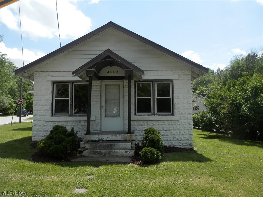 2 BR Bungalow on Stow's East side.  Solid Block constructed home with attached Garage. Shopping and restaurants all around.  Way cheaper than rent!  This is a Fannie Mae HomePath Property.