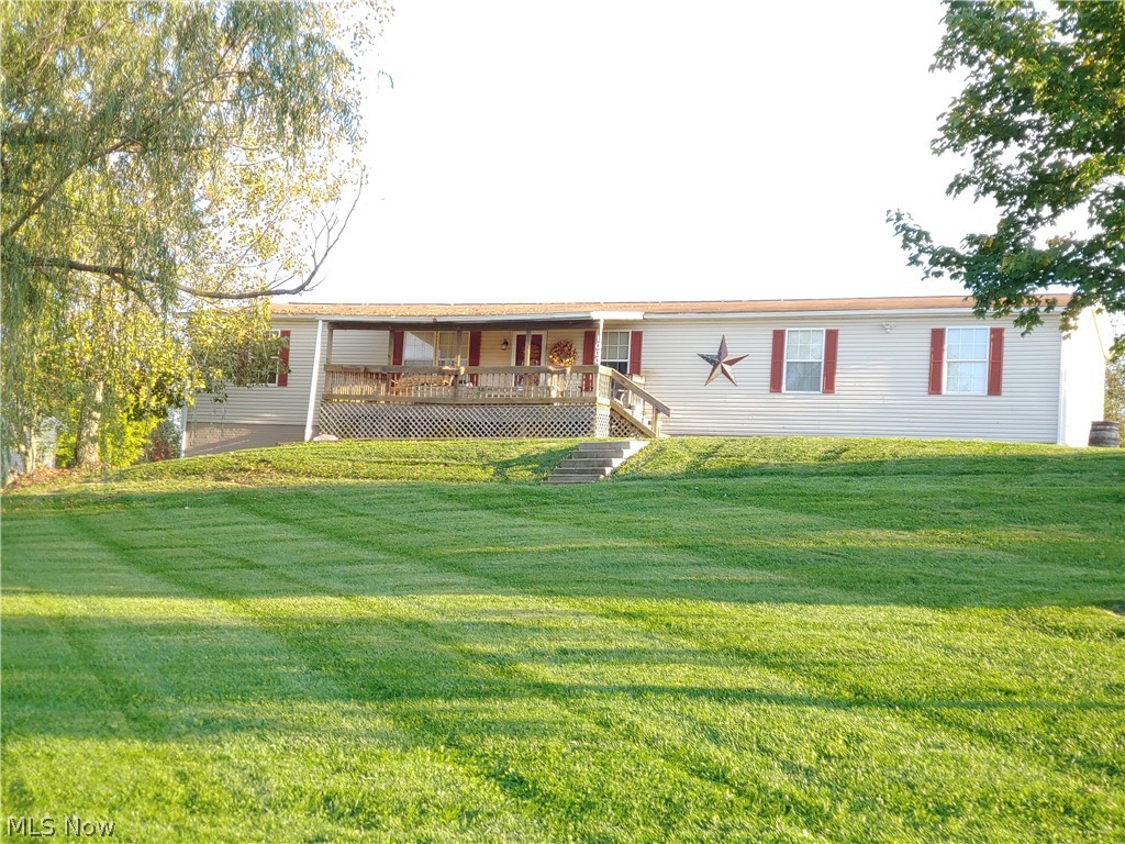 West Muskingum Ranch with 2752 Finished Square Feet In 9 Rooms That include 4 Bedrooms and 2 Baths, Main Floor Laundry Room Full Poured Wall Basement with Recreation Room and Garage Plus an An Additional 32' x 24 " Garage, 416 Square Foot Rear Deck that over Looks the Valley to the Rear, 24 Foot By 12 Foot Covered Front Porch, Semi - Circular Drive for Easy Access to Front Entry and Both Garages, Open Floor Plan Great Room is Complete with Main Floor Family Room, Main Floor Office That could Serve as a 5th Bedroom, Tremendous Master Bath With Walk-In Shower And Corner Jacuzzi Corner Tub, Walk-in Pantry off the Kitchen,  Equipped with Central air and Two Heat Sources, Forced Air Propane Plus outdoor Wood Burner This Spacious Home is Truly in Move in Condition  That includes Super Views of the Valleys in Font and at the Rear of the Home, Note Water Supply is Well But Owners have Paid for the Water Tap out Front if one would want to Hook onto Public Water.