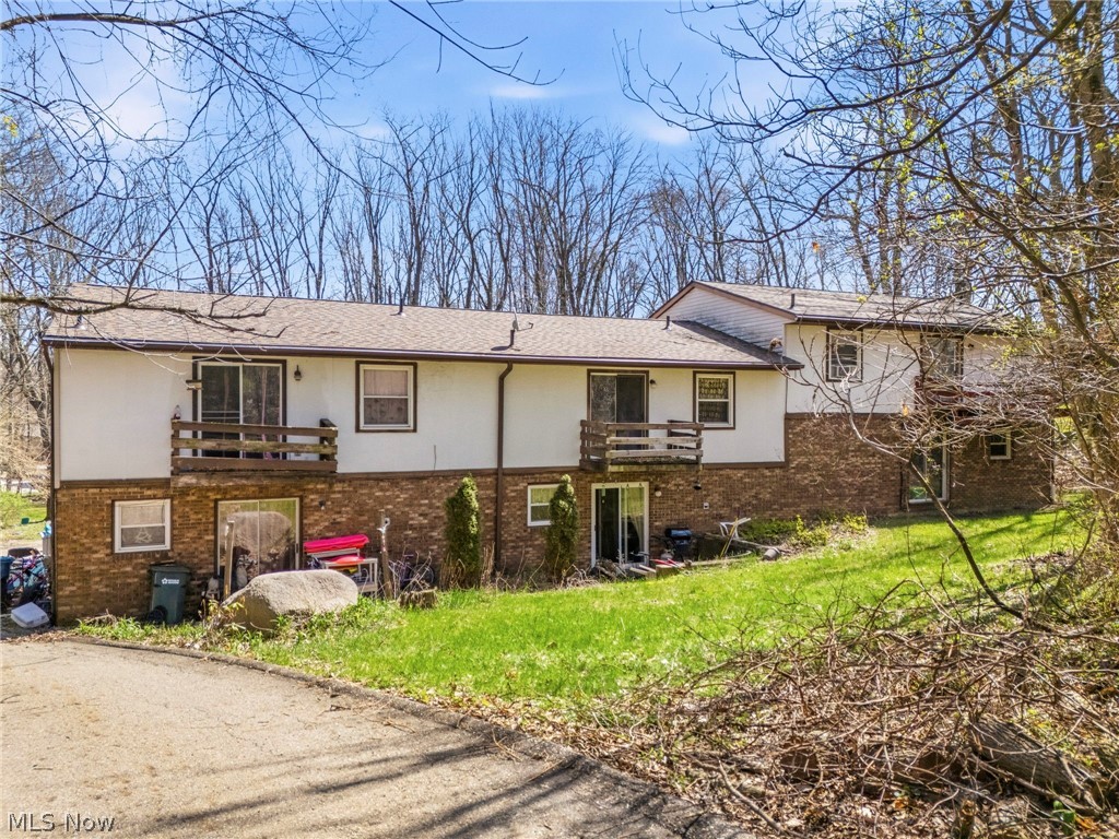 Great investment opportunity with solid upside potential, located in the highly rated Green Local School District! This triplex features three spacious units, each offering 3 bedrooms, 1.5 baths, and the convenience of private in-unit laundry. Unit C stands out with a cozy fireplace and exclusive basement access. Each unit is all electric and includes a 1-car garage, along with a small private patio area for outdoor enjoyment. The property does need some TLC, but it’s a fantastic value-add opportunity for investors or even an owner-occupant looking to build equity over time. Major improvements have already been taken care of, including a new commercial-grade septic system (2025) and a roof replaced in 2020—giving you a strong head start on the big-ticket items. Priced well below its true market potential—and with a tax value of $395,000—this is an opportunity you won’t want to miss. Showings will begin with access to the primary unit only, with second showings available for the two tenant-occupied units. If you’ve been looking for a multi-family property with space, potential, and a desirable location, this is one worth taking a look at!