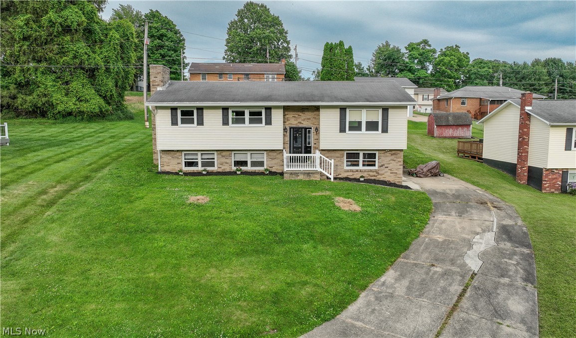 Nicely updated split-level home in Barnesville, Ohio offering plenty of space and flexibility. The main floor features an eat-in kitchen with a dining area, a bright living room, three bedrooms, and a full bathroom. The primary bedroom includes its own half bath for added convenience. The home has seen numerous updates, including refinished hardwood floors, new vinyl flooring, new kitchen cabinets, fresh drywall, and an opened-up wall between the dining and living rooms that creates a more spacious, connected feel. The lower level adds even more room to spread out with a large family room featuring a wood-burning fireplace, a possible fourth bedroom or office space, a full bathroom, laundry area, utility/bonus room, and an additional rec room that could be used as a playroom, workout space, or whatever fits your needs. Outside, you'll appreciate the new back deck, perfect for enjoying your morning coffee or spending time with family and friends. The gas furnace and central air were replaced around 2019, providing added peace of mind. Oil and gas rights will not be conveyed.